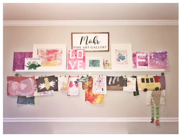 Artwork hanging from clips