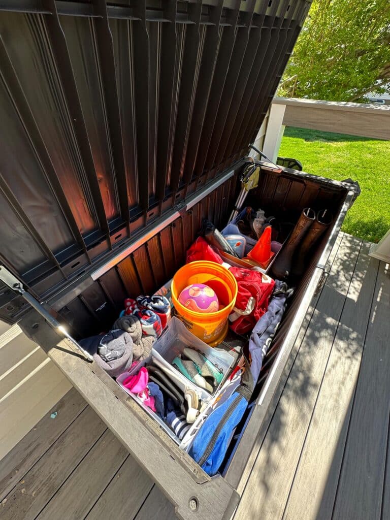 Deck box with pool toys