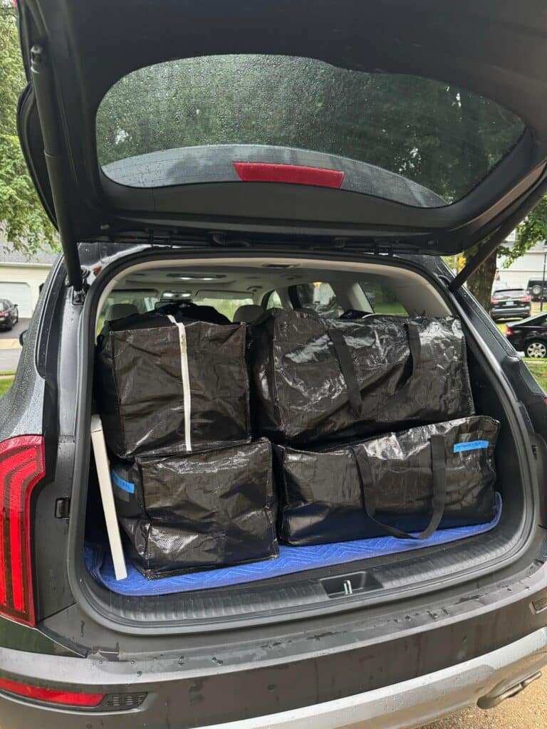 Car loaded with moving bags for dorm move-in
