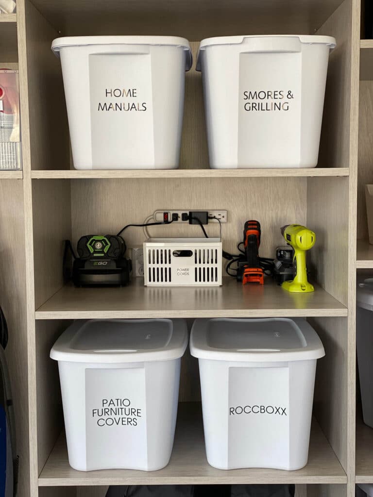 Bins with labels can help you find everything after you organize your garage