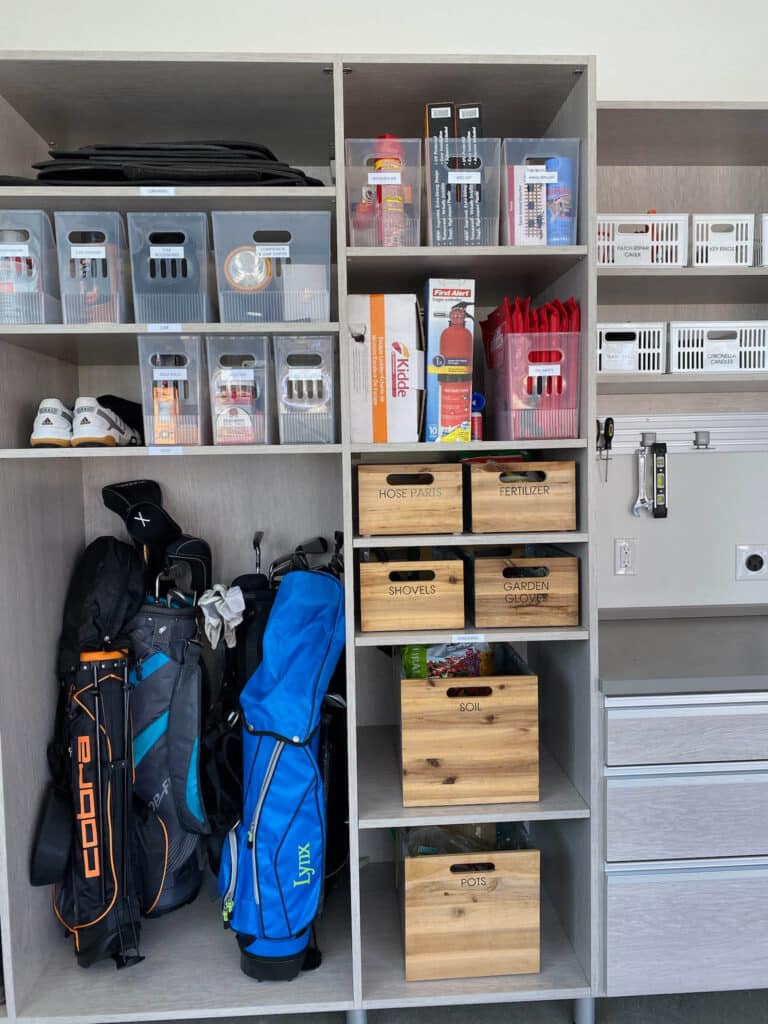 Bins with labels can help you find everything after you organize your garage