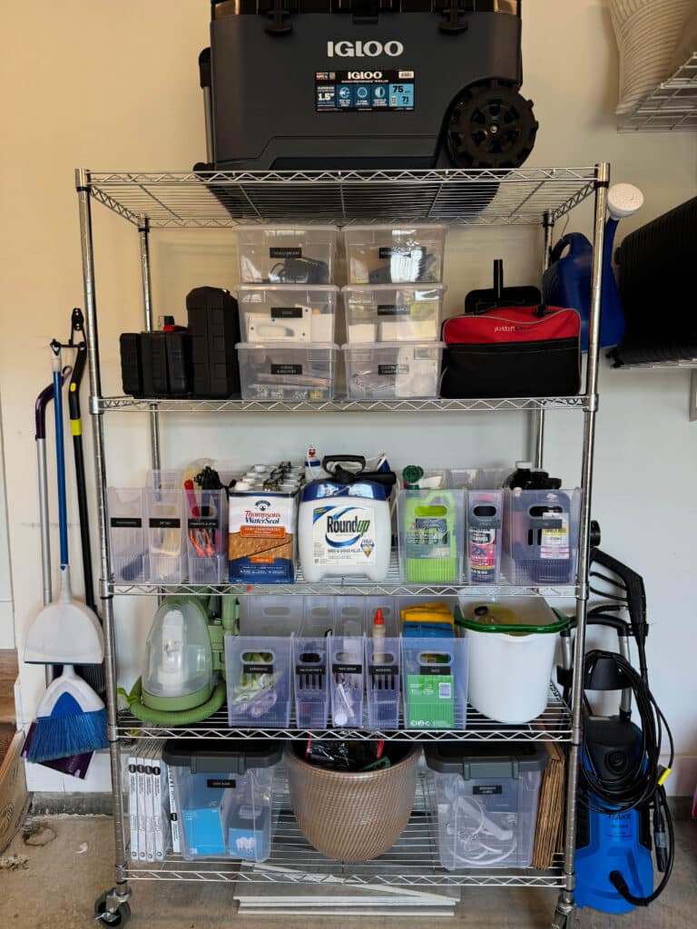 Sturdy shelves move things off the floor in an organized garage