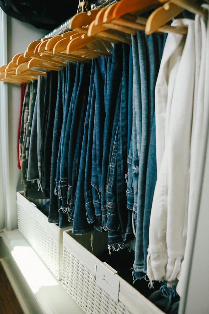 Jeans grouped together in a closet