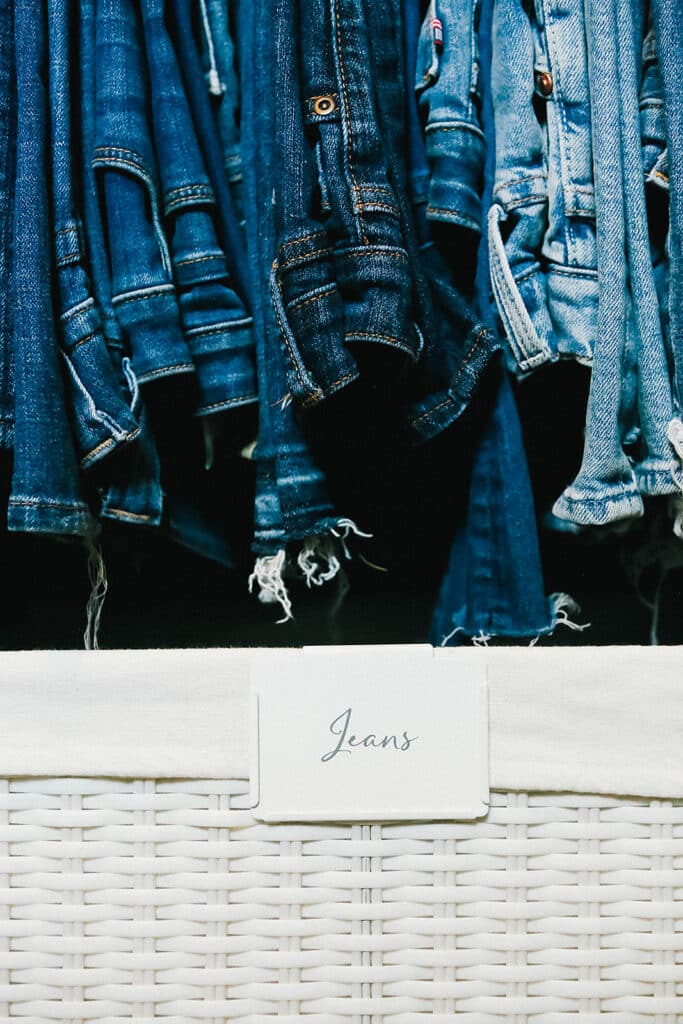 Jeans grouped together in a closet